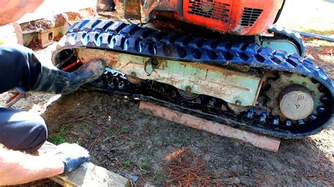 case mini excavator track replacement|how to change excavators tracks.